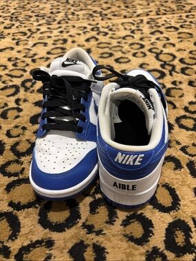 Nike White and Blue Low-Top Sneakers with Black Laces